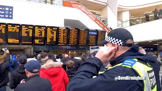 KEEP RIGHT ON: Blues fans at New Street station