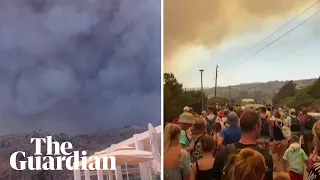 Thousands flee Greek island of Rhodes as wildfires threaten hotels