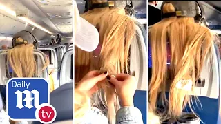 Furious plane passenger sticks gum and dips woman's hair in coffee - DailyMail TV
