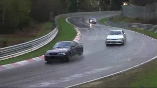 Nissan 350Z drifting in rain / Nissan Skylines overtaking Porsche @ Nürburgring 04/2009