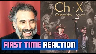 Chitãozinho & Xororó - Evidências (Ao Vivo) first time reaction (italian reacts to brazilian music)