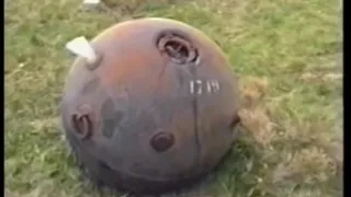 Pushing a naval mine off a mountain