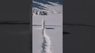 Snowball Rolling Downhill Forms a Giant Wheel - 1288497