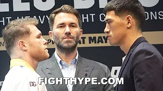 ANGRY DMITRY BIVOL MEAN MUGS CANELO DURING 2ND INTENSE FACE OFF; STARE HIM DOWN & EYES ALL HIS BELTS