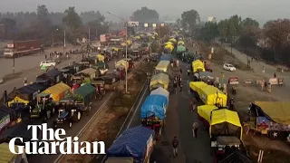 Drone video shows farmers occupying India highroad in pay dispute protest