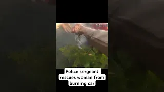 Police sergeant rescues woman from burning car