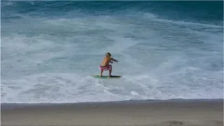 Professional Skimboarders Slide Out to Waves at a Creek Mouth - Raw Footage