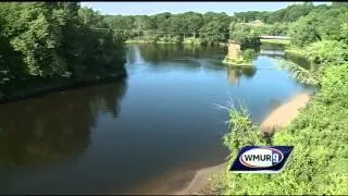 Crews recover body of boy, search continues for father in Merrimack River