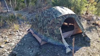 Father and son bushcraft camping in USMC 2 Man Combat Tent