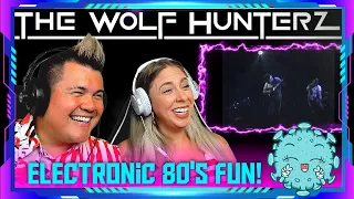 We react to "New Order - The Perfect Kiss (Live Netherlands 1985)" | THE WOLF HUNTERZ Jon and Dolly