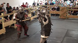 Brutal armored combat axe fight full contact steel weapons in Dallas Texas