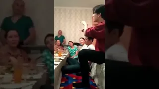 Dimash sings with friends.