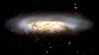 Hubble Zooming Into NGC 4522 [720p]