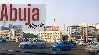 Welcome to Abuja, the capital city of Nigeria. POV driving through Abuja NIgeria.