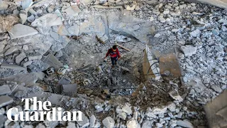 Residents of Rafah assess damage after Israeli airstrike in Gaza