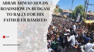 Abrar Ahmad holds roadshow in Budgam to rally for his father Er Rasheed