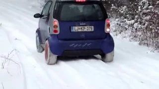 Auto Sock: snow socks on Smart car 1