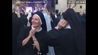 nuns dancing at a shenseea concert