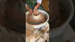 Making a porcelain and black clay mix bowl.