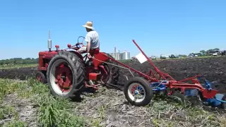 Farmall H plowing