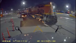 BNSF train & IDIOT amazon trucker