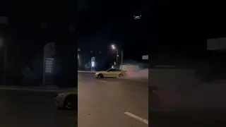 BMW drifting on street / drifting