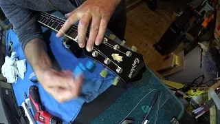 Re-stringing a 3-tuners-aside guitar (with tuning stability in mind!).