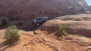 Tip Over Challenge fun, New Land Rover Defender. Hell's Revenge trail, Moab UT