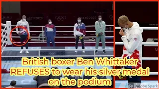 British boxer Ben Whittaker REFUSES to wear his silver medal on the podium stuffs it in his pocket