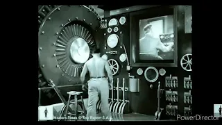 Charlie Chaplin swallowed by  factory machine modern times -1936