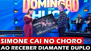 Simone Mendes cai no choro no palco do Domingão com Huck ao receber Diamante Duplo