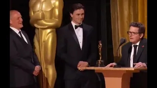 Woody Harrelson Presents Michael J. Fox With an Honorary Oscar for His Humanitarian Efforts