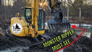 Destroying Beaver Dams with Excavator