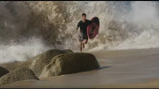 Skimboarder Unable to Outrun Huge Wave in Cabo San Lucas - Raw Footage