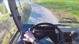 Au volant d'un Renault R312 sur une route de campagne