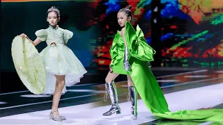 The children walk catwalk in green style clothes | Fashion show