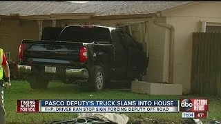 Pasco Deputy's truck slams into house