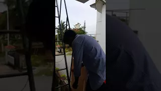 Opening coconut with teeth