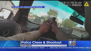 Officers Fires Through Own Windshield While Chasing Murder Suspects