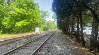 Amtrak PO29 at Garrett Park, MD with a baggage car on the rear.