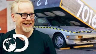 Can A Domino Chain Reaction Be Used To Crush A Car?! | MythBusters Jr.