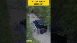 Range Rover Defender offroad in mud terrain