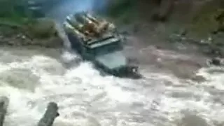 Ural 4320 truck goes through river