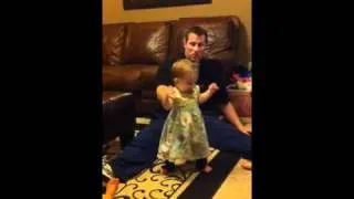 Babies first steps cute. Dads face priceless