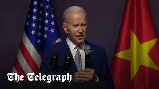 President Biden interrupted by White House staff at press conference in Vietnam