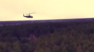 Russia-Ukraine War. Russian Ka 52 helicopters attack Ukrainian 2S1 Gvozdika howitzer