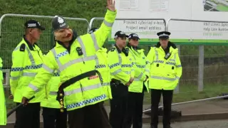 Protester in pig mask protests outside Wrexham prison site