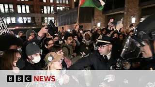 University protests: Protesters defy Columbia deadline to leave campus | BBC News