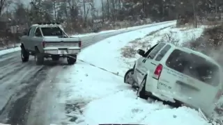 79 Ford F250 pulling van out of ditch in snow