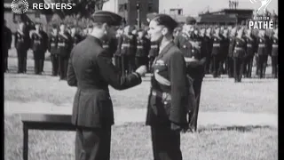 The King and Queen visit an RAF aerodrome for general inspection and presentation of medals (1940)